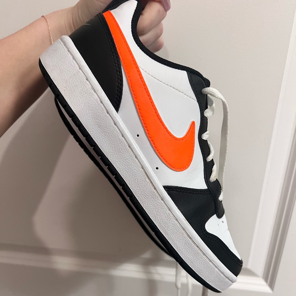 Orange swoop Nike dunks